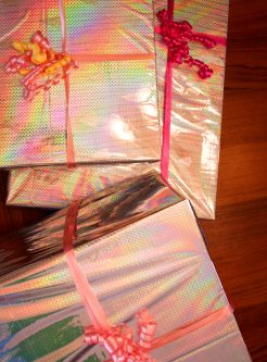 silver and pink iridescent wrapped presents