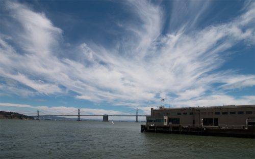 the bay bridge and warehouse pier along the embarcadero, san francisco, california