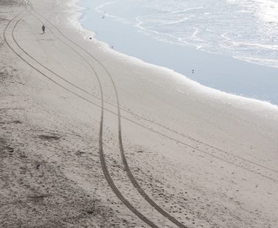 car tracks along ocean beach, san francisco, california